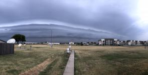 A picture of a storm approaching NWS Fort Worth with a large shelf cloud.