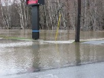 Photograph of flooding of the Ft. Kent, ME Credit Union on Main Street on April 30, 2008