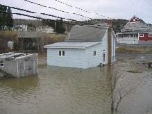 Photograph of homes flooded along  the St. John River on East Main Street in Fort Kent, ME on April 30, 2008