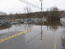 Photograph of flooded businesses along Martin Street in Cumberland, RI