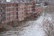 Photograph of the flooded Ashton Mills in Cumberland, RI
