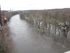 Photograph of the flooded Blackstone River Bike Path near Ashton Mills on the Lincoln/Cumberland, RI town line