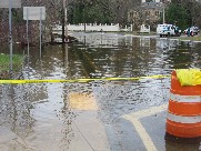 Photograph of the Sudbury River flooding downtown Wayland, MA
