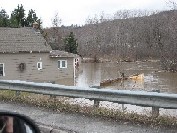 Photograph of a home flooded near Route 161 in Fort Kent, ME on April 30, 2008