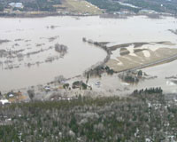 Photograph of flooding of the Fish River along Market Street/Rte 161 in Fort Kent, ME on April 30, 2008