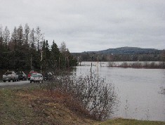 Photograph of a flooded road in Northern Maine on April 30, 2008