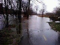 Photograph of the flooded Blackstone River Bike Path near Ashton Mills in Lincoln, RI