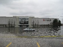 Photograph of flooding of the Pawtuxet River at the Warwick Mall