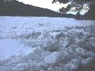 Photograph of snow and river ice along the Hudson River upstream of North Creek, NY in February 2000