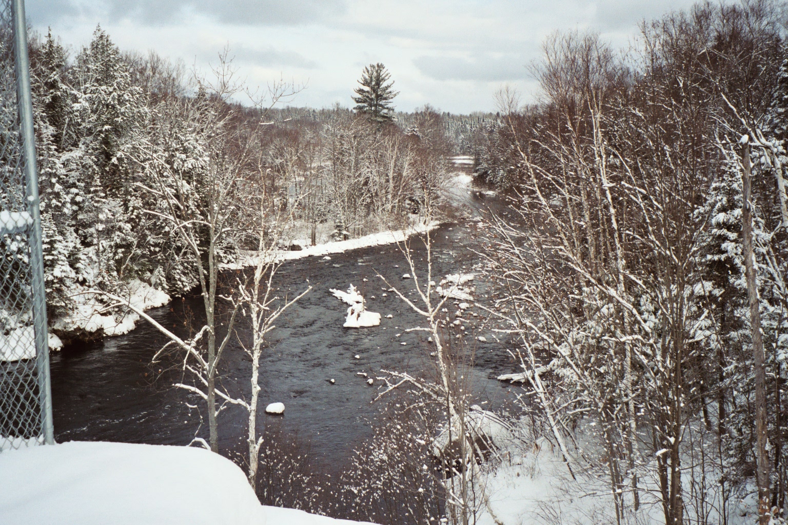Photograph of snow and river ice along the Indian River near Indian Lake, NY (INDN6) looking downstream