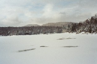 Photograph of snow and river ice along the Indian River near Indian Lake, NY (INDN6) looking upstream
