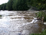 Photograph of the Missisquoi River at North Troy, VT (NTYV1) during high flow