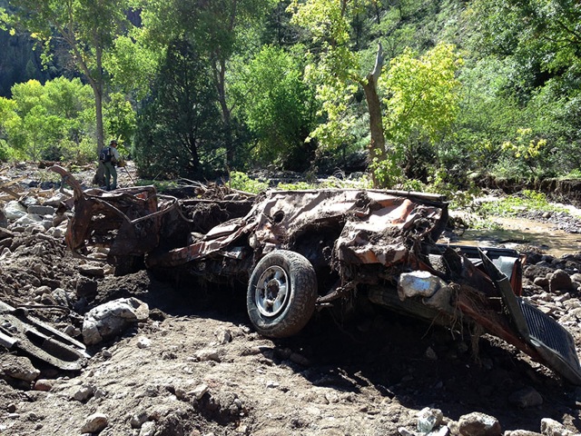 Several vehicles were swept away by flood waters into Silver Creek near Mogollon. Image taken on September 19, 2013 a few days after flood waters had subsided.