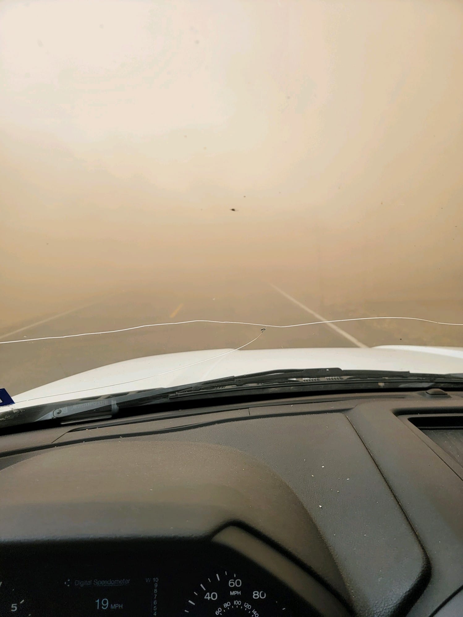 Photo by Dustin Sides Valdez of very low visibility due to blowing dust in Guymon, Oklahoma on February 14th, 2023