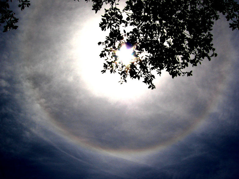 What is the source and the meaning of a large halo around the sun