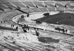Clearing snow out of Memorial Stadium following blizzard.   Source: Minneapolis Star Journal
