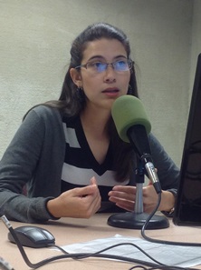 NWS Brownsville/Rio Grande Valley Forecaster Maria Torres conducts radio broadcast from Radio Esperanza studios in Edinburg, Texas, on November 13 2013
