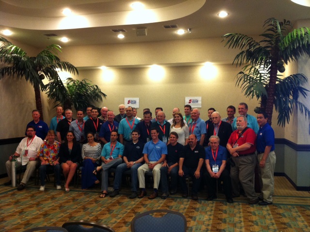Group photo of primarily television and print broadcast meteorologists and other attendees at the 2014 Second National Tropical Weather Conference