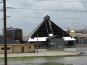 A-frame roof partially off industrial building (click to enlarge)