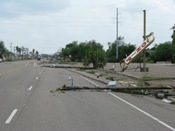Telephone poles down; bingo sign upended (click to enlarge)