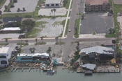 Roof and structure damage to Palm Street Bar and Grill and Louie's Backyard (click to enlarge)