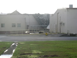 Photo of roof damage to a warehouse along expressway 77 northbound in Harlingen from Tropical Storm Hermine(click to enlarge)