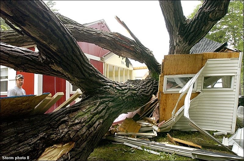 click for a photo gallery of pictures from the Erie microburst