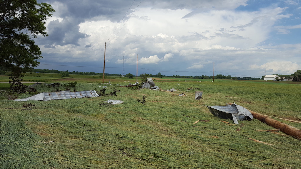 Sheet Metal in a Field Off of a Roof of a Barn in Wayne County due to a Microburst
