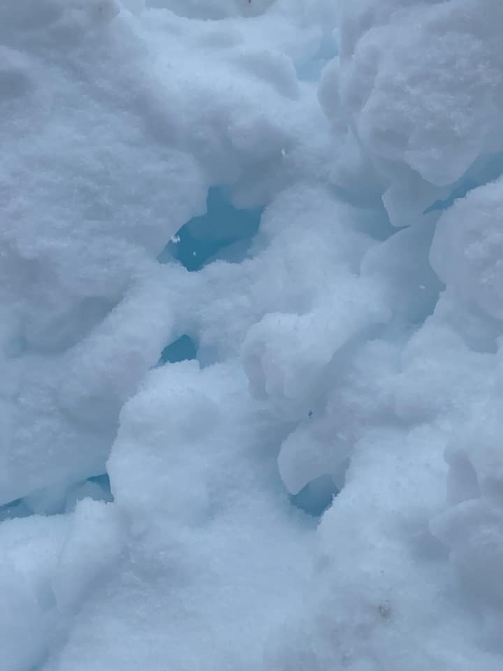 photo of blue appearing snow