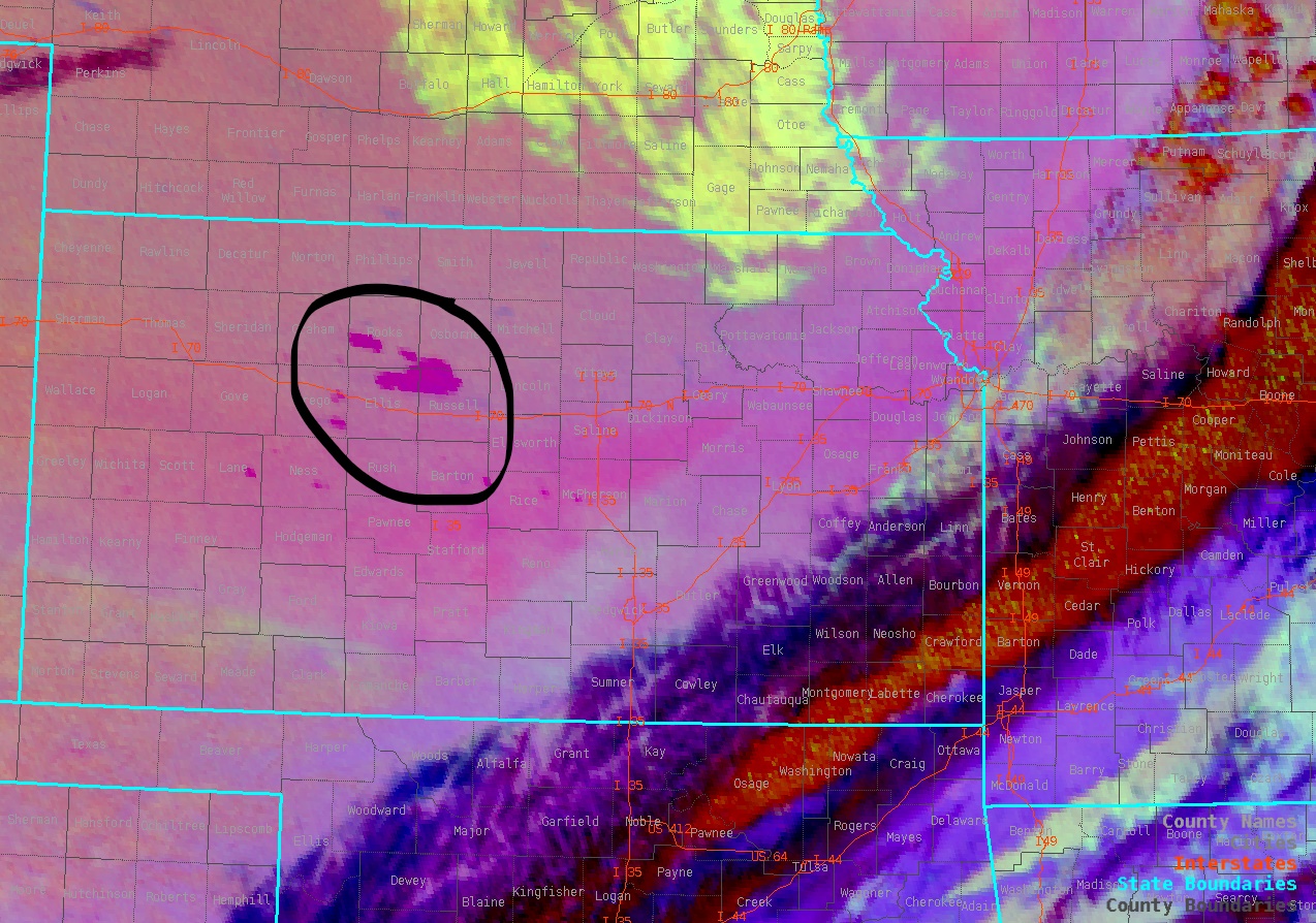 Photo of satellite imagery highlighting a large grass fire in Russell County KS,