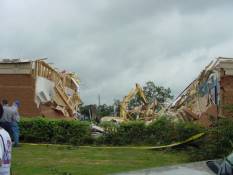 [ Fort Valley (Peach County) bank destroyed.  Some damage caused as part of clean-up operations. ]