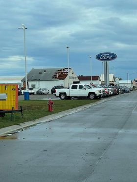 Tornado Damage, Roof ripped off of Ford dealership in Park Rapids