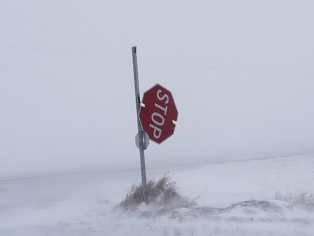 Stop Sign north of Terril Iowa, ripped from pole by strong winds 
