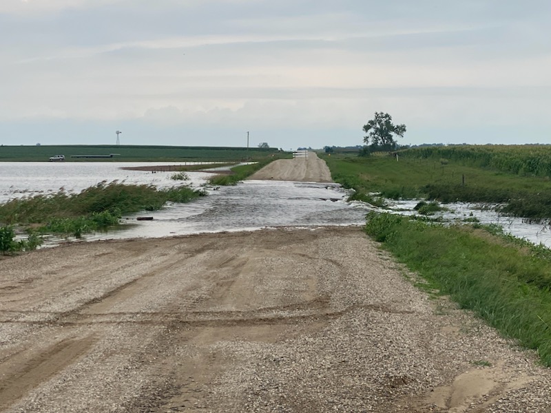 Water flows over a low spot in the roadway north of De Smet South Dakota.