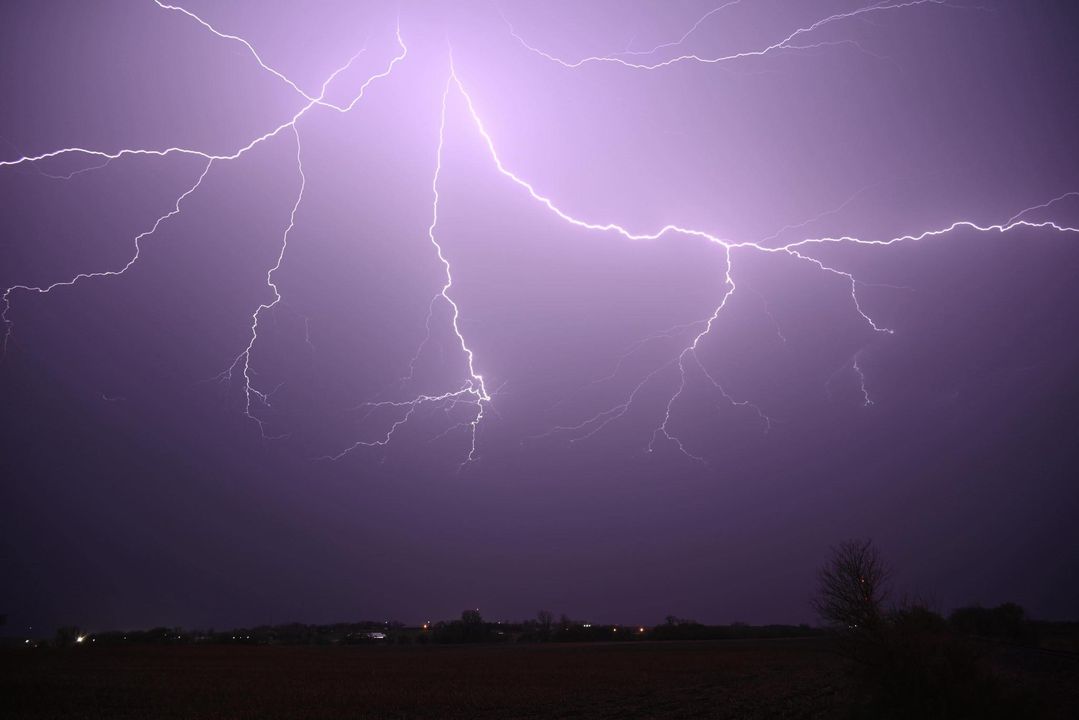 Photo of lightning fanning out across the sky near Le Mars Iowa.