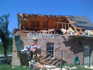 Picture of a home damaged near Forney, Texas.