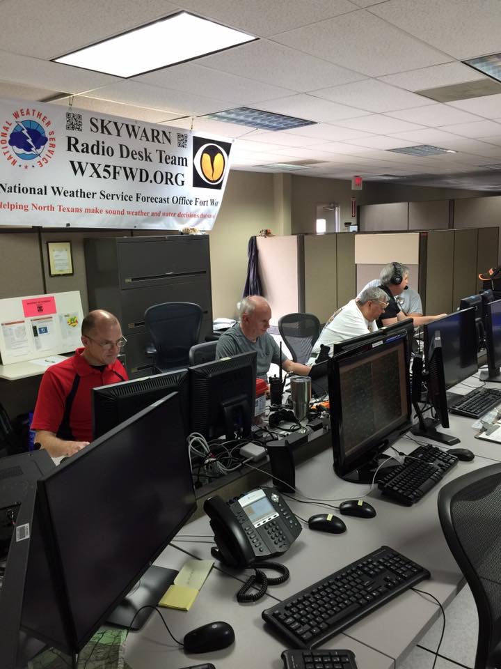 A picture of Amateur Radio operators working HAM radios at NWS Fort Worth.