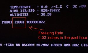 Photo of the ASOS weather display at the Wilmington NWS office during the ice storm of February 11-12, 2014.  This was the first time hourly ice accretion data was available!
