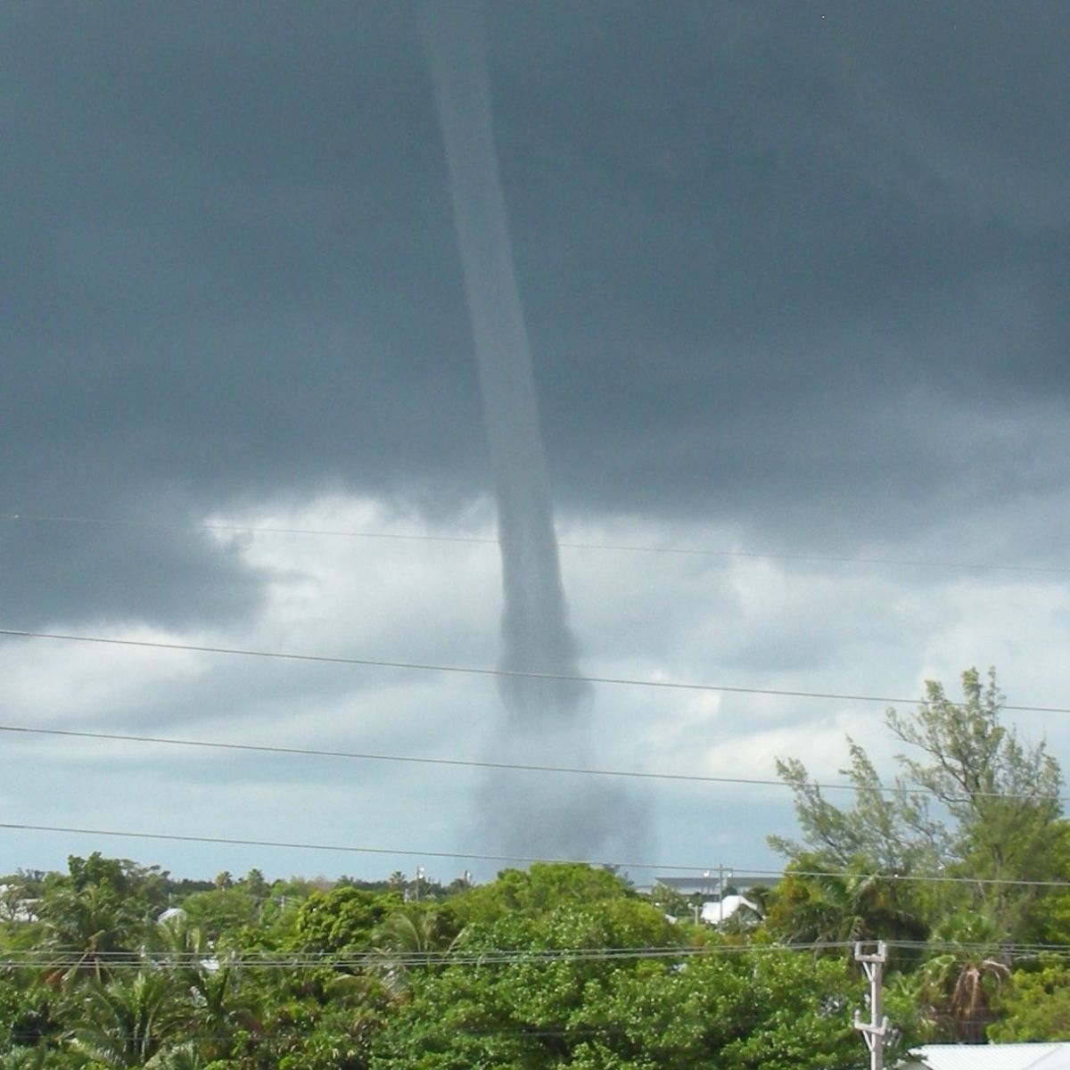 Waterspout seen from the Florida Keys NWS with a thick, dark condensation cloud