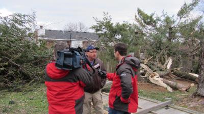 Joe Sullivan talks to the media during a storm survey