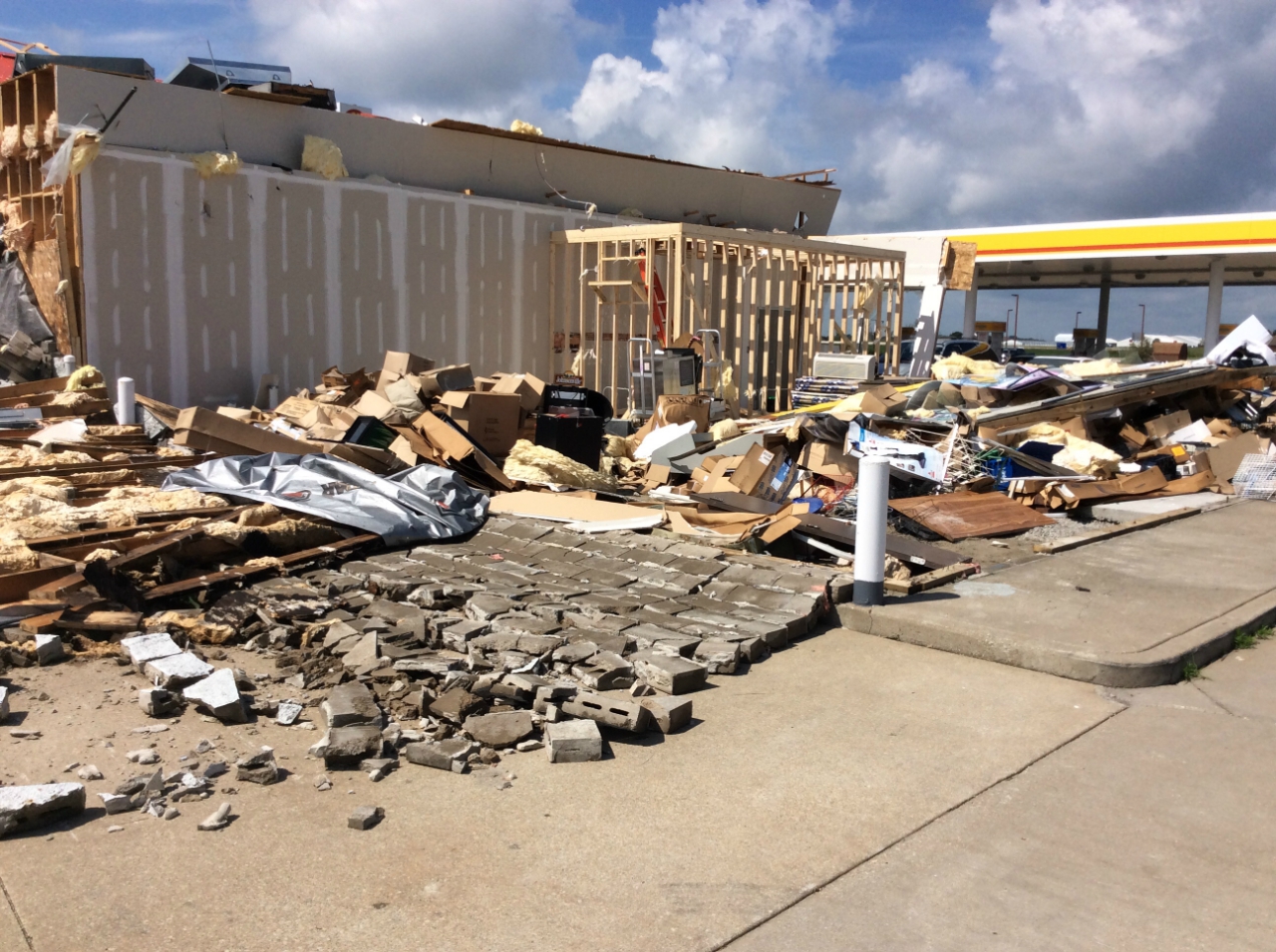Photo showing damage to a gas station from the Pontiac tornado