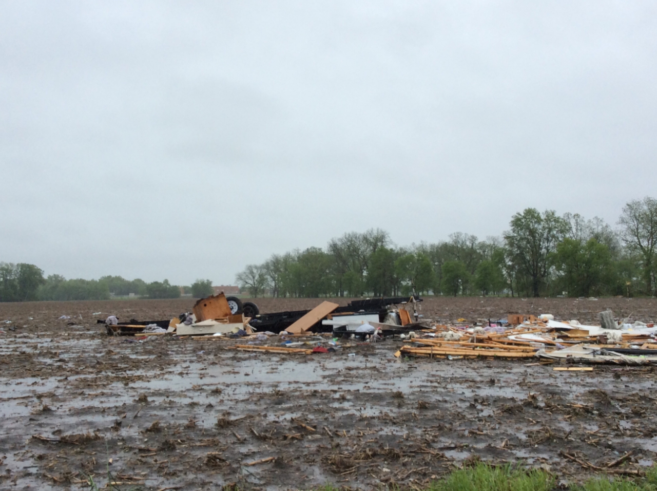 Photo of debris pushed out to nearby field.