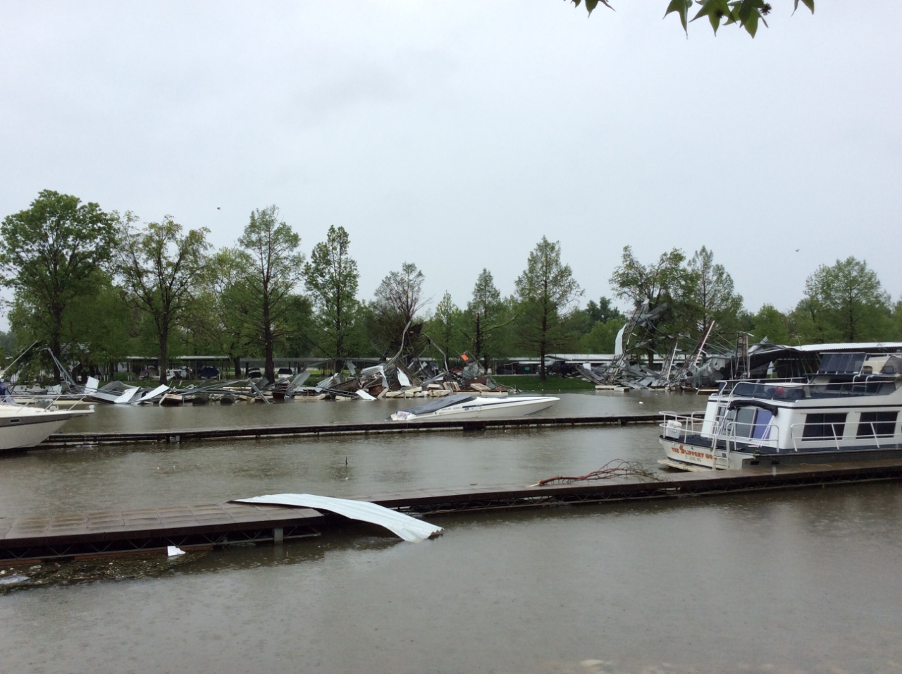 Photo of two boat docks destroyed at Lake Center Marina.