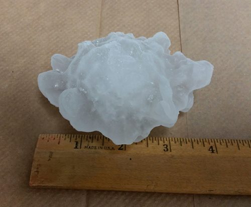Photo of four inch diameter hail at the NWS office in Weldon Spring, MO.