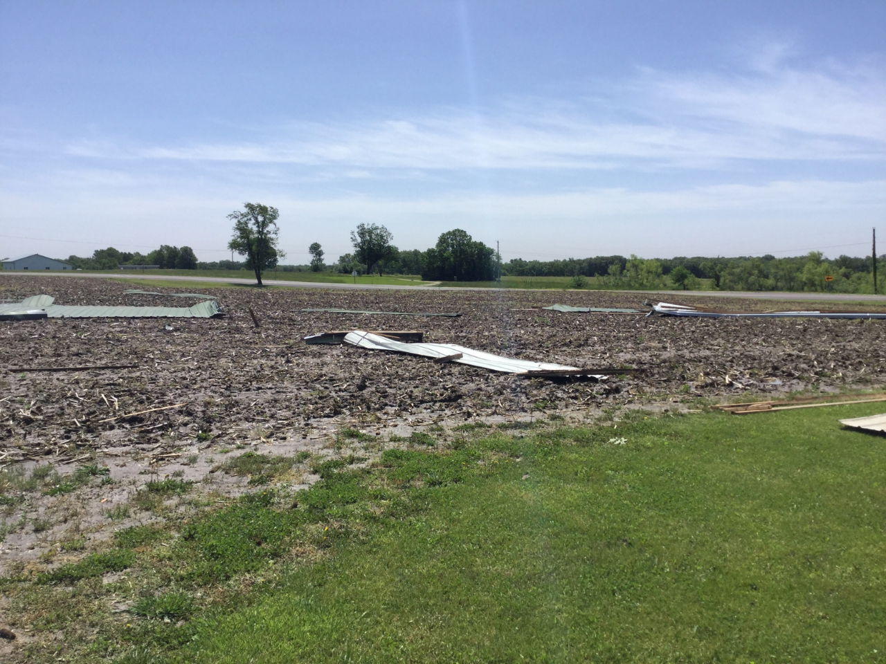 Photo of roof panels blown into the nearby field.
