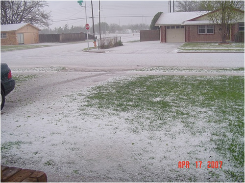 Picture of hail in southwest Lubbock. The photo is by Tasha Coalson courtesy KCBD-TV.