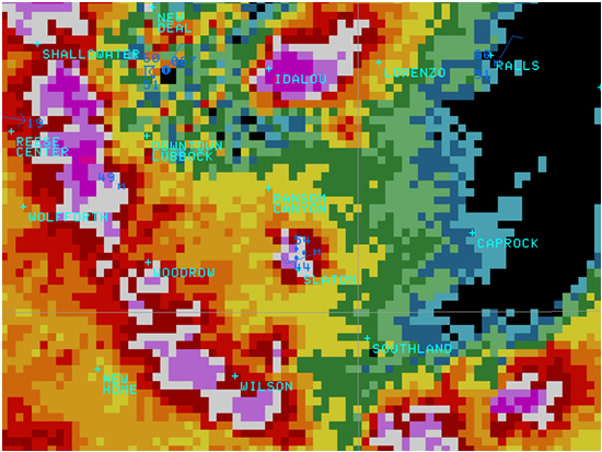 Doppler radar composite reflectivity image shows the Slaton storm developing.  The surface observations also are overlaid to show the proximity of the surface boundary and its wind shift.