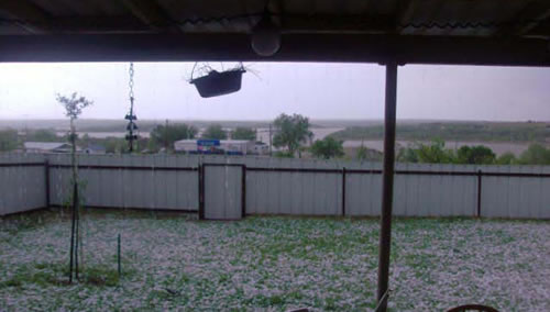 Image of hail that fell in White River Lake on 26 April 2008. Note the hail in the foreground and the lake in the background. Click on the image for a larger view. Picture courtesy of Tim Walker.