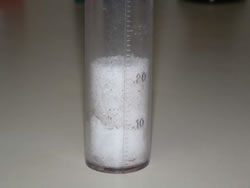 Picture of ice, snow and sleet accumulated in a rain gage located in Lubbock. Click on the image for a larger view.