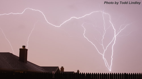 Photograph of lightning striking a tower in south Lubbock